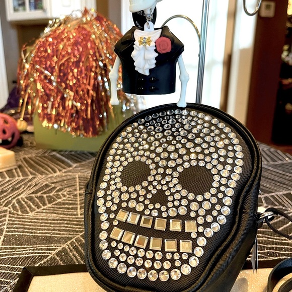 Bath & Body Works Handbags - 🔥BLOWOUT SALE🔥SKULL CROSSBODY PURSE & GLOW IN DARK SKELETON POCKETPAC HOLDER!